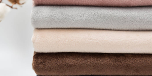 What fabric is good for a nightgown?  Do I need to wear clothes under my nightgown?