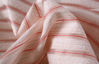 What are the characteristics of woven fabrics?